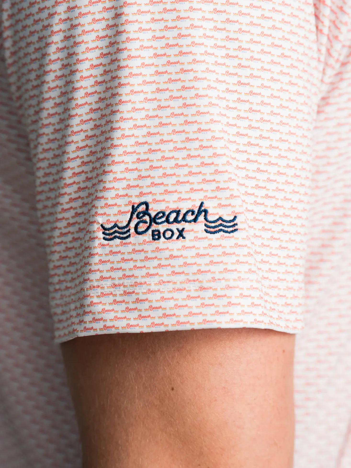 Beach Box polo sleeve with custom micro print and embroidery