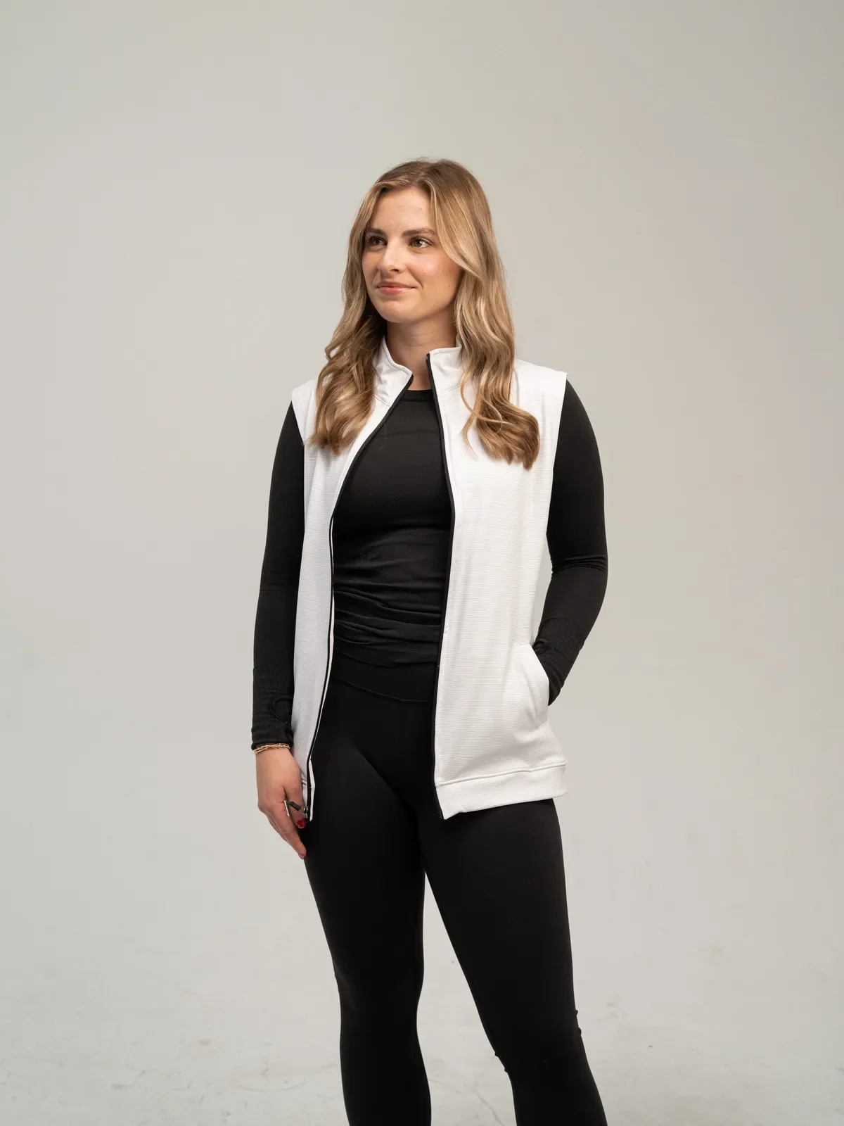 White women's vest worn by a model