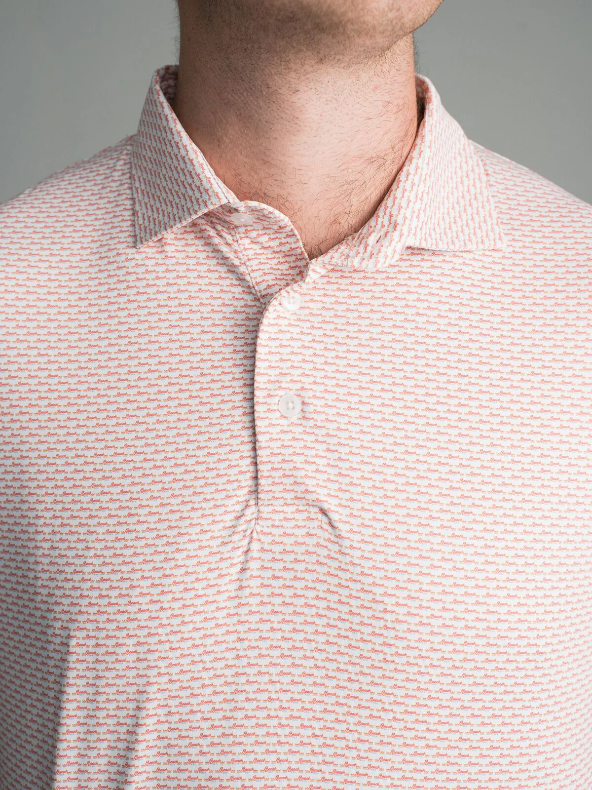 Custom apparel with a coastal micro print pattern for a hospitality brand