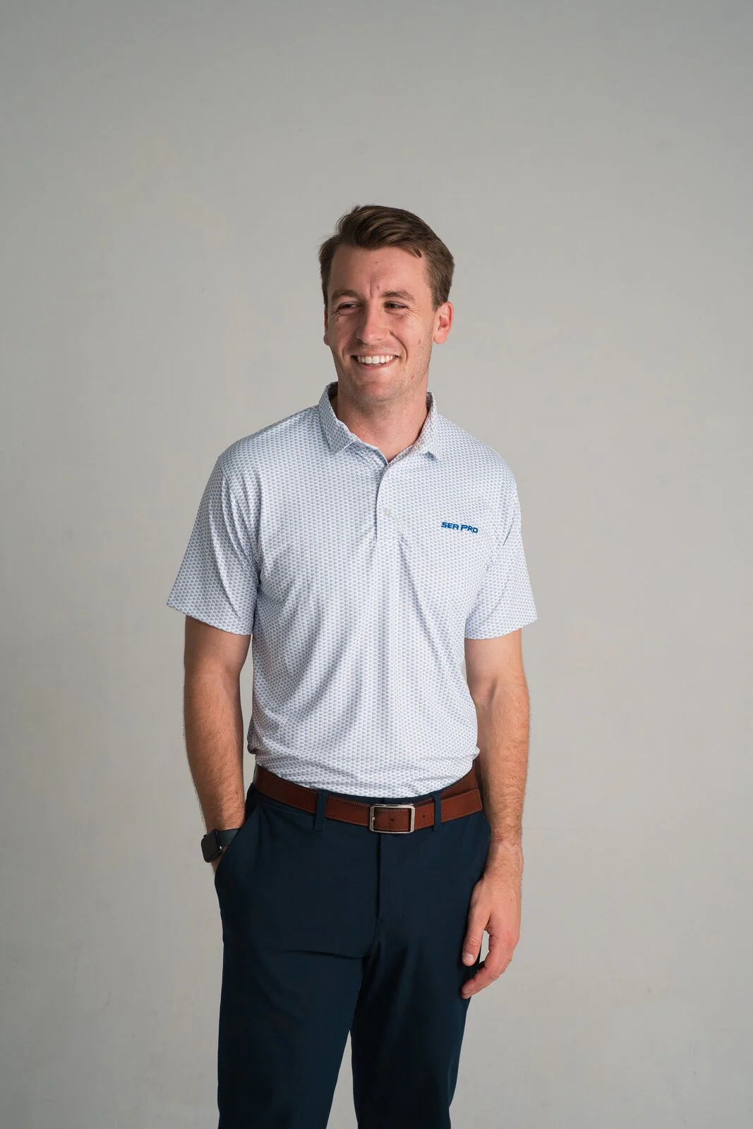 Custom polo with a marine themed micro print for a boating brand
